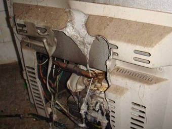 隱患產品令人擔憂 冰箱起火誰該負責?--中關村在線